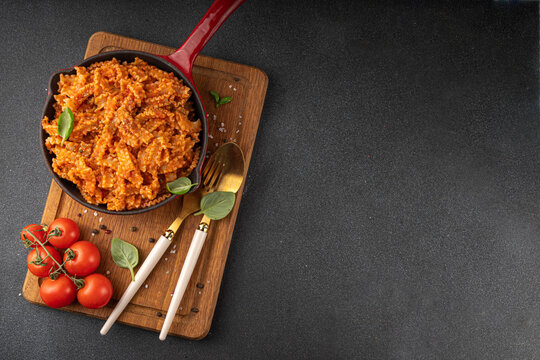 Mafaldine pasta with bolognese tomato sauce