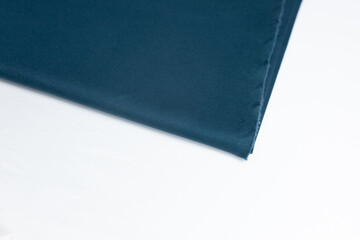 viscose fabric blue on white background. fabric for clothes