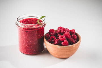 Fresh Raspberries: Juicy, Ripe Berries for a Healthy Summer Snack on a white background