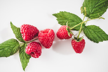 Fresh Raspberries: Juicy, Ripe Berries for a Healthy Summer Snack on a white background