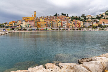 Obraz premium view of the bay, colorful facades and roofs of the historic center of Menton in Provence