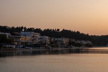 sunset over coastal buildings