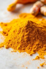 Vibrant yellow turmeric powder heap isolated on a white background, emphasizing its culinary appeal.