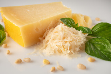 Authentic Italian Parmigiano Reggiano: Aged Cheese Wedge Isolated on White Background