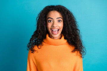 Fototapeta premium Portrait of nice young girl open mouth wear orange sweater isolated on turquoise color background