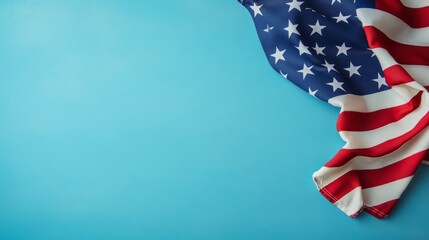 Obraz premium American Flag Draped on a Blue Background