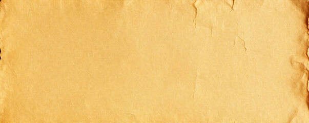 Vintage parchment paper background showcasing aged texture and natural fibers