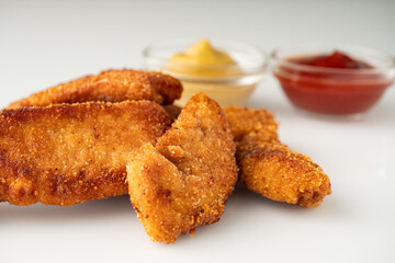 Crispy Chicken Strips with Spicy Mustard and Ketchup Sauces