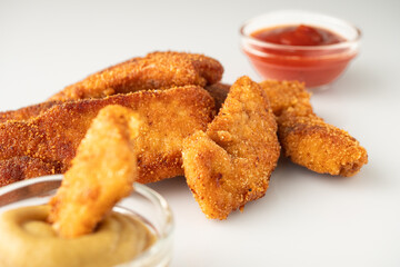 Crispy Chicken Strips with Spicy Mustard and Ketchup Sauces