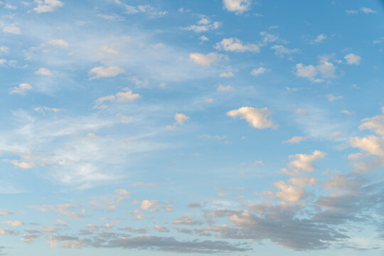 Soft white clouds scattered across a blue sky at dawn, clouds, sunrise, sunset, dawn, dusk, coleccion cielos 