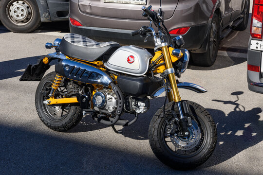 ISTANBUL, TURKEY - OCTOBER 27, 2024: Small motorcycle (Honda Monkey 125 cc.) parking at park area.