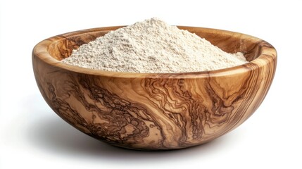 Round wooden bowl filled with fine flour, creating a clean and rustic look, isolated on white background
