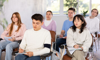 Fototapeta premium Teenagers study in the classroom on refresher courses in the classroom school