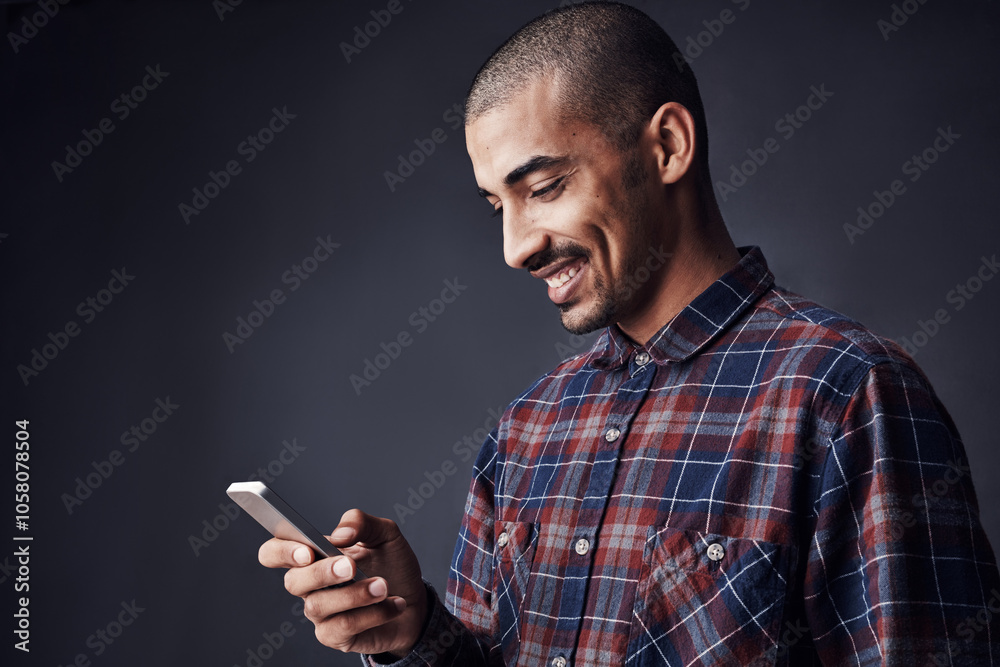 Poster man, smile or phone in studio for social media, good news or feedback for creative small business. d