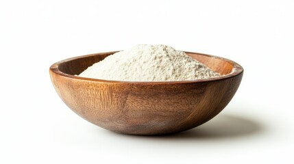 Wooden bowl filled with fine white flour, showcasing simple ingredients, isolated on white background