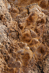Hot water over a brown stone with texture