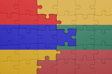 Fototapeta premium puzzle with the colourful national flag of armenia and flag of lithuania .