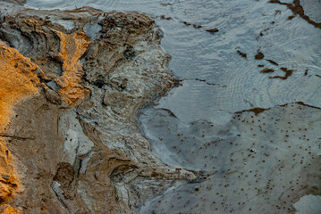 cracked ground with cracks, its notoriety chiefly because of its sulphurous mud springs called solfataras and steam springs called fumaroles.