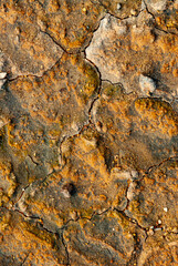 cracked ground with cracks, its notoriety chiefly because of its sulphurous mud springs called solfataras and steam springs called fumaroles.