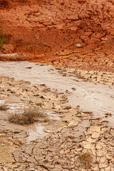 cracked ground with cracks, its notoriety chiefly because of its sulphurous mud springs called solfataras and steam springs called fumaroles.