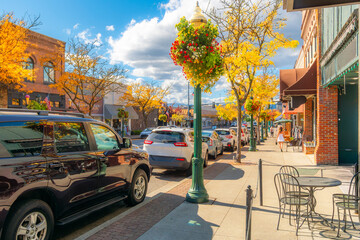 Shops and sidewalk cafes on Sherman Avenue in the lakeside small town of Coeur d'Alene, Idaho at...
