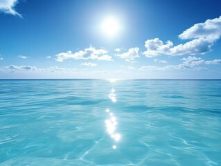 Obraz premium Tranquil ocean scene with rippling blue waters and sunlight, capturing serene sky and peaceful ambiance for themes of relaxation.
