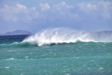 Playful white caps dancing over breaking waves on Maui.