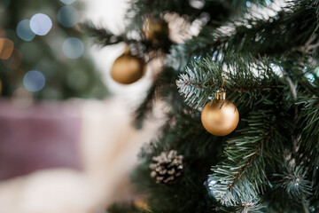 Festive Christmas Tree Glimmering with Golden Ornaments