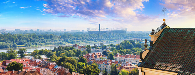 Cityscape, panorama, banner - top view of neighbourhood of Powisle eastern bank of the Vistula River with the Stadion Narodowy, in center of Warsaw, Poland © rustamank