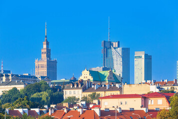 Naklejka premium Cityscape - view of the district of Srodmiescie with the Old Town and high-rise modern buildings in the center of Warsaw, Poland