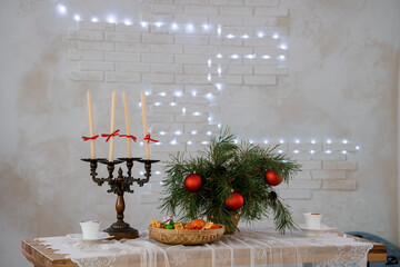 Cozy Christmas Table Setting with Candles and Festive Decorations