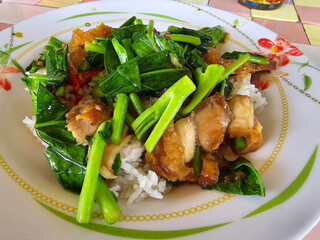 thai spicy fried crispy pork with vegetables