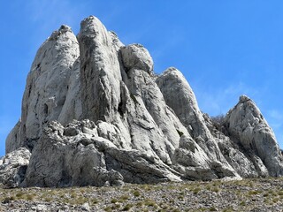 Rocky ridge of Tulove grede or karst mountain peak of Tulovice - Velebit Nature Park, Croatia (Stjenoviti greben Tulove grede ili krški planinski vrh Tulovice - Park prirode Velebit, Hrvatska)
