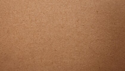 Fototapeta premium A textured, brown surface resembling cork or wood grain, displaying a uniform pattern with fine details and slight variations.