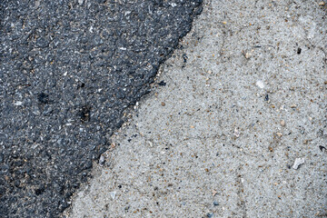 The part where the material at the edge of an asphalt road separates