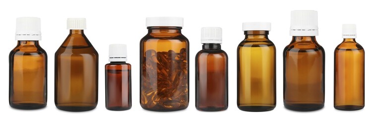 Many different glass bottles isolated on white