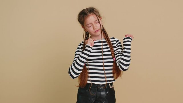 Tired exhausted young preteen child girl kid yawning, sleepy inattentive feeling somnolent lazy bored gaping suffering from lack of sleep falling asleep. Teenager children isolated on beige background