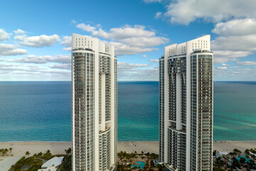 Aerial view of Sunny Isles Beach city with luxurious highrise hotels and condos on Atlantic ocean...