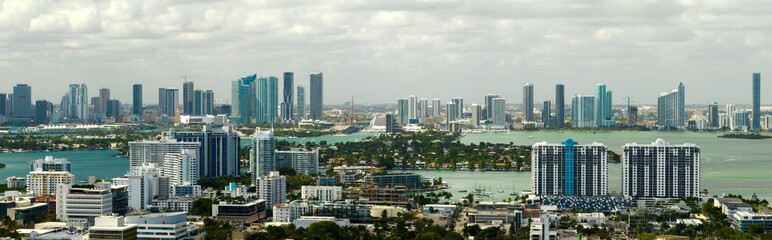 View from above of concrete and glass skyscraper buildings in downtown district of Miami Brickell in Florida, USA. American megapolis with business financial district on sunny day