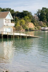 Fototapeta premium House with Boat Ramp: Scenic Waterfront Property and Outdoor Living