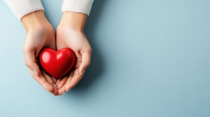 Fototapeta premium Caring Hands Holding a Heart Symbol for Recovery