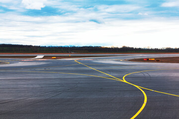 Empty runway strip with markings. Asphalt airport runway