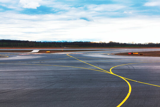 Empty runway strip with markings. Asphalt airport runway