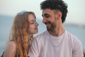 Fototapeta premium closeup portrait of cute loving young couple on the beach