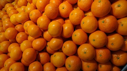 Mandarin oranges in market stall