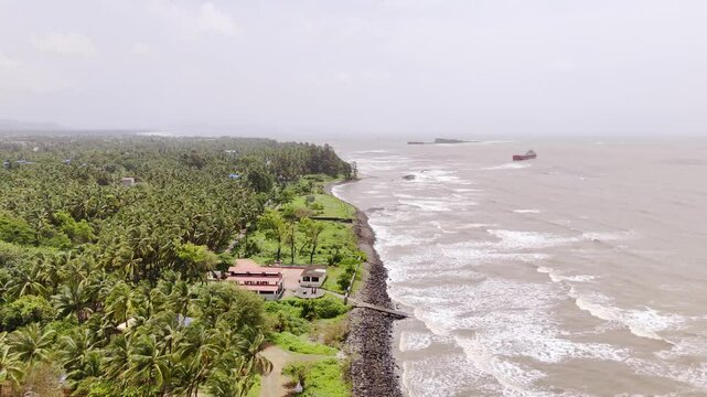 Aerial View of Rocky Shoreline and Ocean Waves