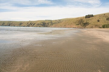 Okains Bay Beach: Scenic Coastal Paradise in New Zealand
