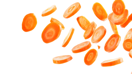 Falling carrots slices, isolated on white background