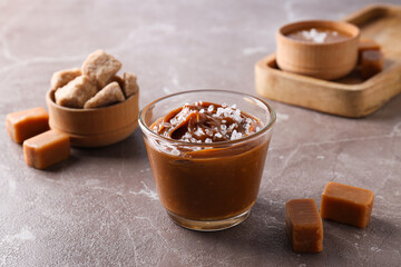 Salted caramel in a glass on a light background