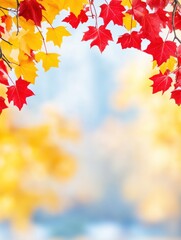 Naklejka premium Vibrant autumn leaves in red and yellow against a blurred background.